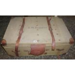 A Vintage Canvas Travel Trunk, With a hinged top stamped for B M Roberts, 37cm high, 88cm wide