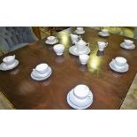 A Minton Part Bone China Tea Service, To include tea pot, cream and sugar, cups and saucers,