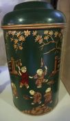Two Chinese Style Painted Tin Tea Cannisters, Of large cylindrical form, Decorated with figures on a