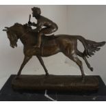 A Cast Bronze Figure Group of a Horse & Jockey, raised on a square plinth base, 25cm high