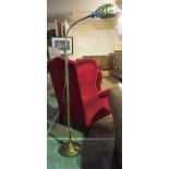 A Brass Floor Lamp, with adjustable reading lamp, 140cm high, fitted for electricity