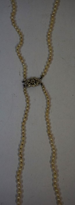 A String of Pearls with a 9ct White Gold & Diamond Clasp, with small stones to the clasp, 38cm long - Image 2 of 8