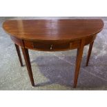 A Mahogany Demi Lune Side Table, with drawer, raised on tapered legs, 73cm high, 119cm wide, 60cm
