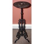 A Victorian Black Patinated Cast Iron Plant Stand, In the style of Coalbrookdale, with a pierced