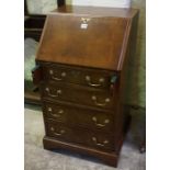 A Good Quality Reproduction Ladies Mahogany Writing Bureau, With a fall front enclosing fitted