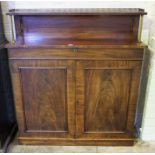 A George IV Mahogany Chiffonier, circa 1830, with a gilt metal gallery top above two panelled doors,