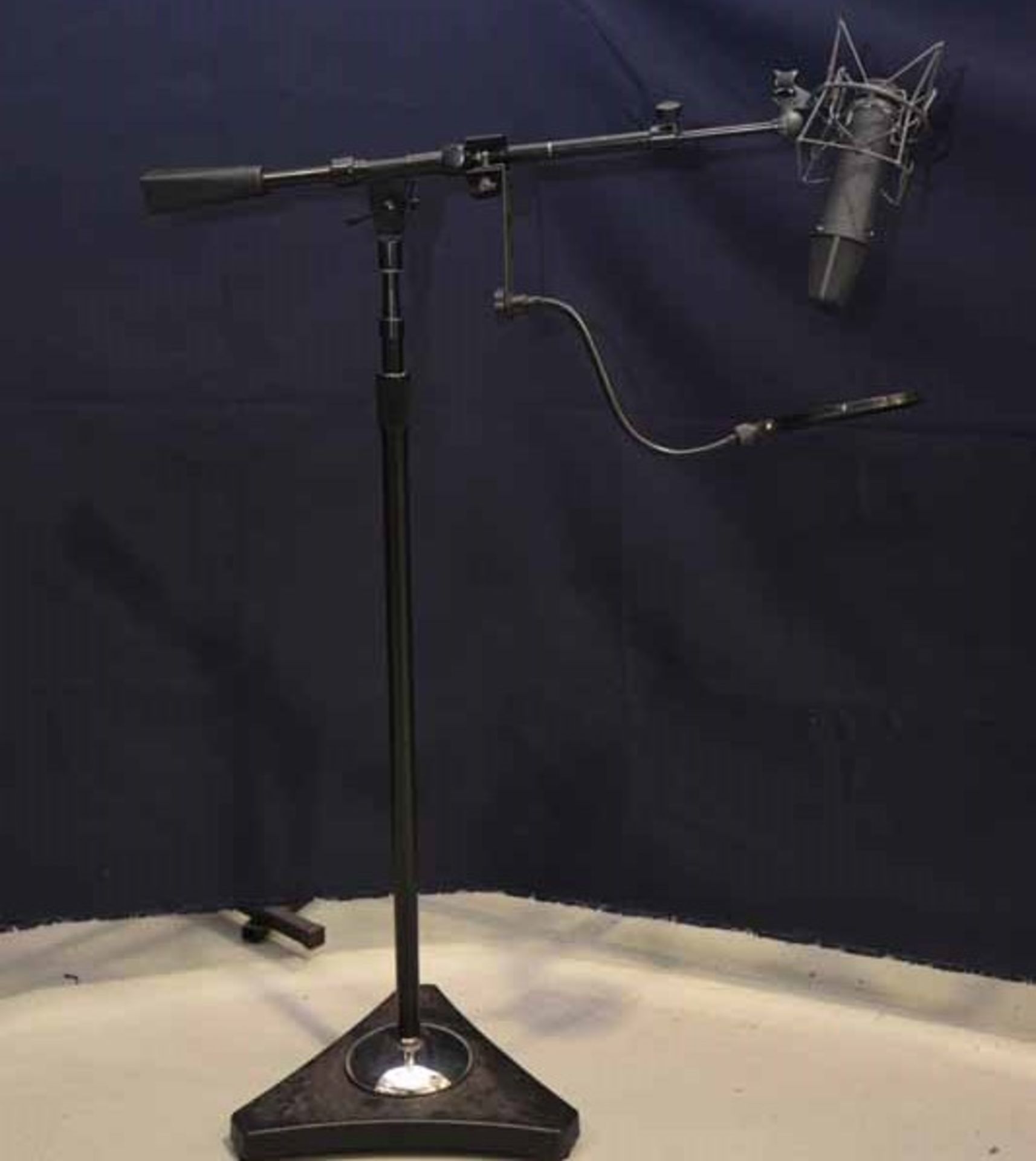 Neumann Type U-87AIP48 microphone (black mic) on a Atlas Sound MS25 pro mic stand w/windscreen - Image 2 of 2