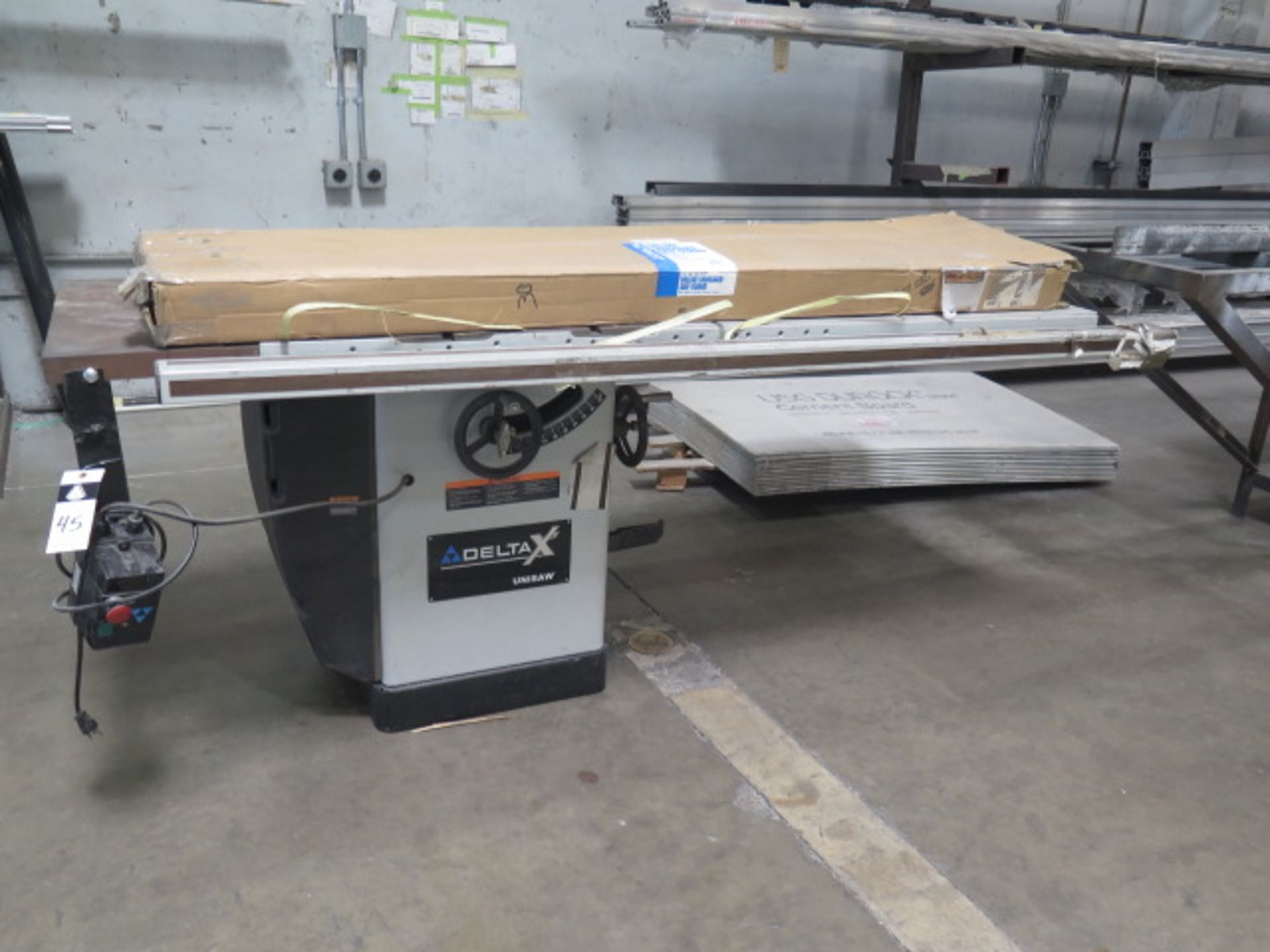 2008 Delta ‘Unisaw” mdl. 36-L31X Table Saw s/n 08B11269 w/ 27” x 84” Extended Table, Blade Guard