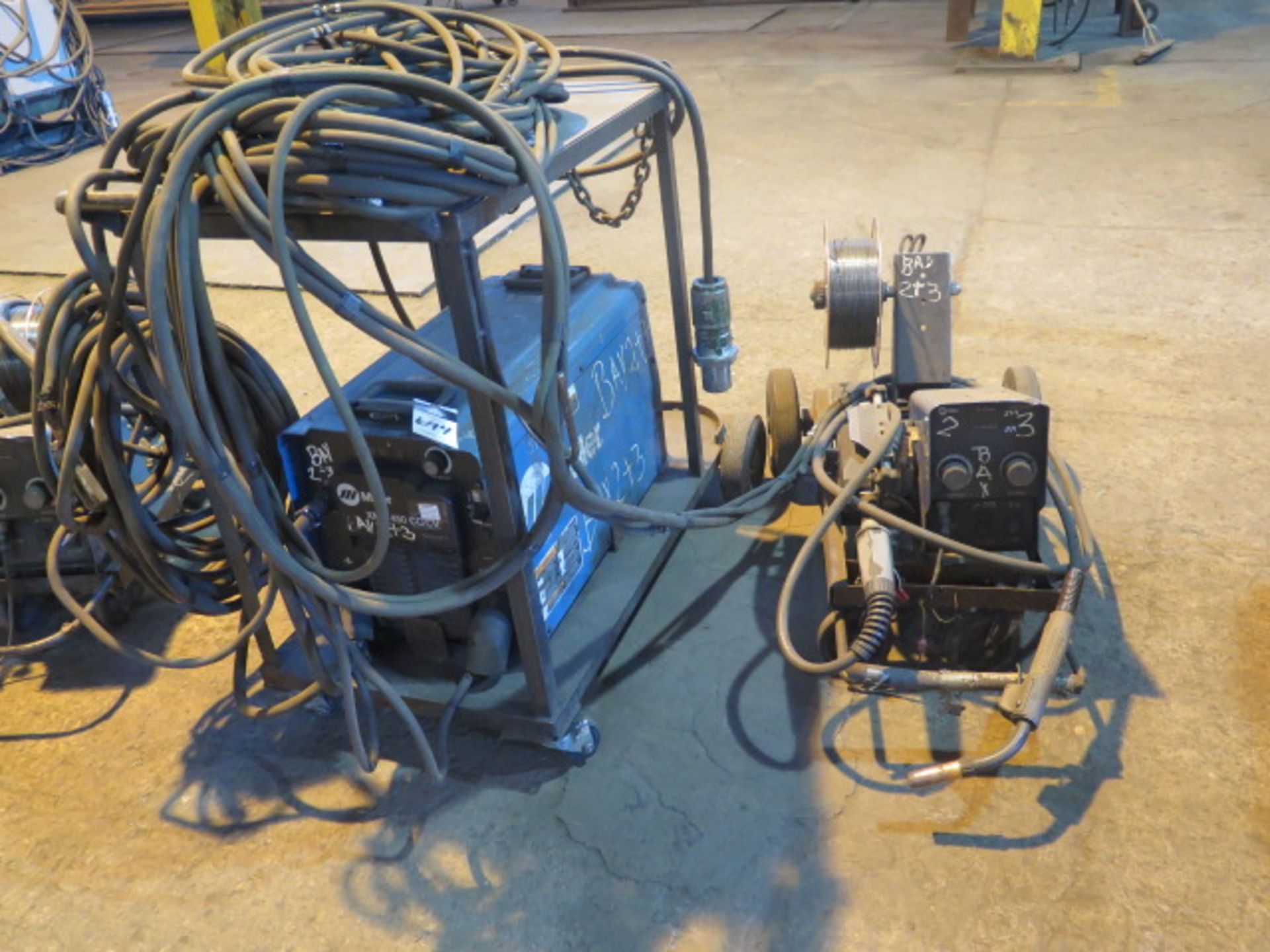 Miller XMT 450 CC/CV Arc Welding Power Source s/n MC450123U w/ Miller 70 Series Wire Feeder