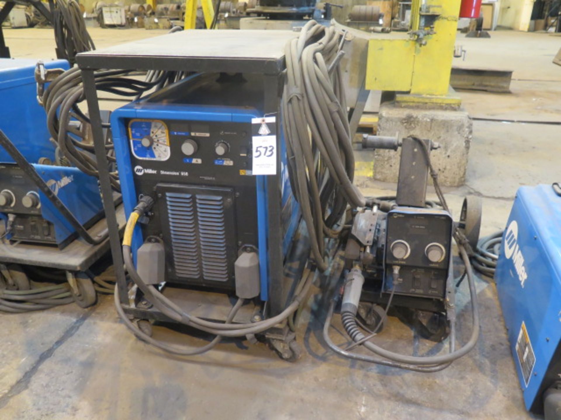 Miller Dimension 650 Arc Welding Power Sources s/n MF250508C w/ Miller 70-Series Wire Feeder