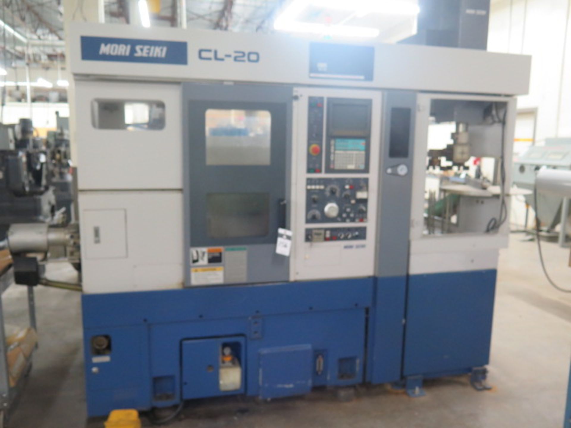 Mori Seiki CL-20A CNC Turning Center s/n 304 w/ Yasnac Controls, 8-Station Turret, Parts Catcher, 8”