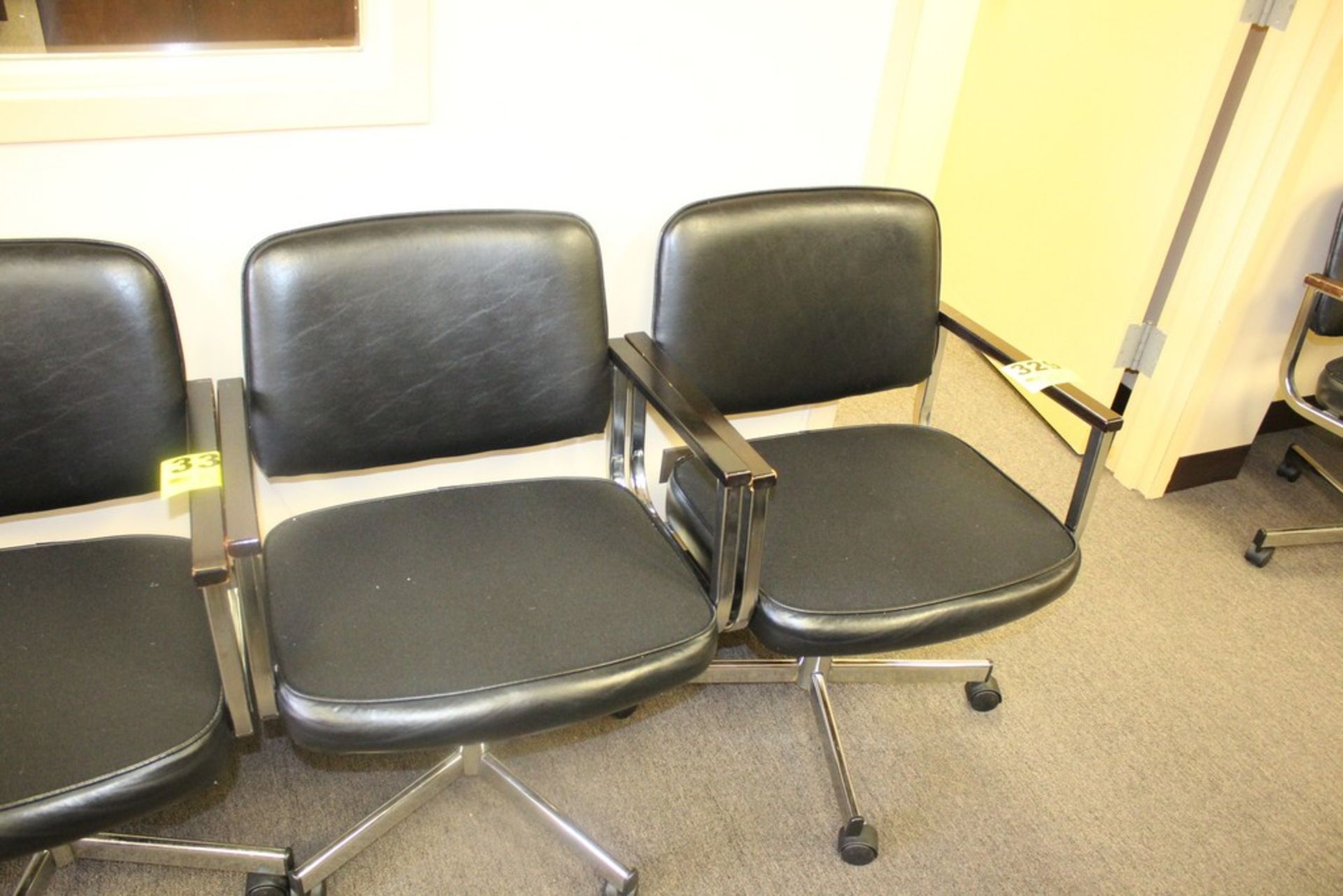 LOT (2) ARM CHAIRS ON CASTERS (BLACK)