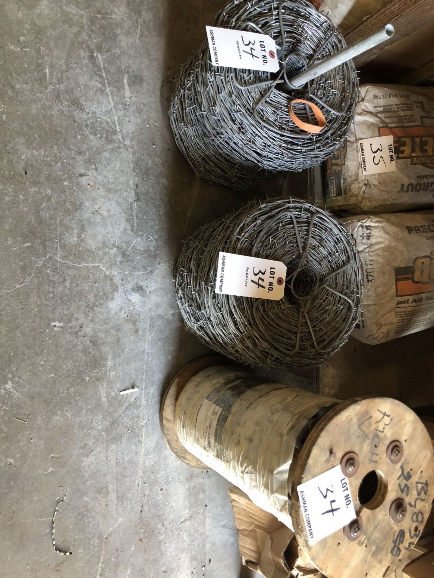 2 ROLLS OF BARBED WIRE AND 1 ROLL OF HEAVY DUTY CHAIN