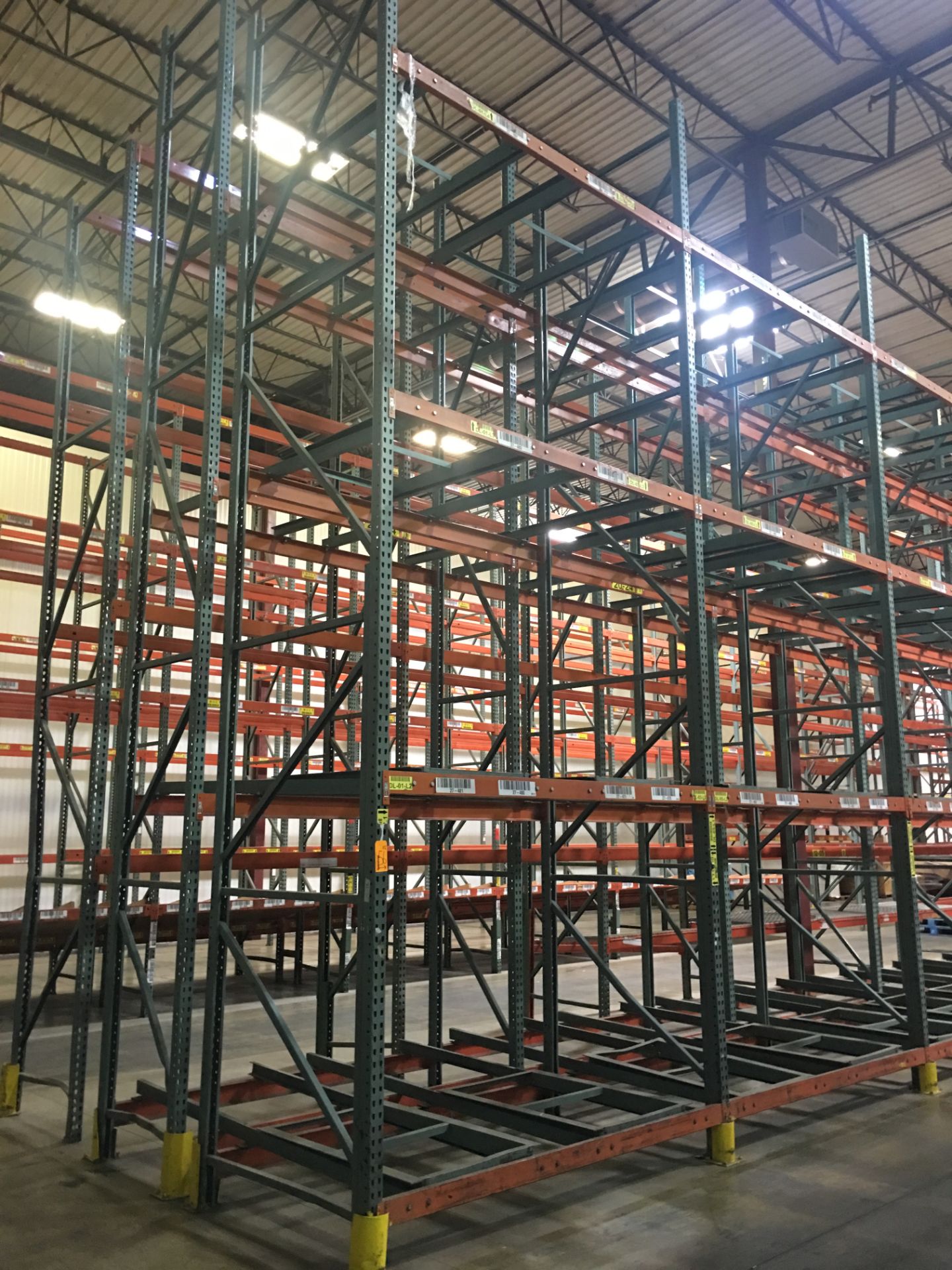 9 BAYS OF PUSHBACK RACKING: 2W X 2D X 4 PALLET HIGH, TOTAL 144 PALLET POSITIONS