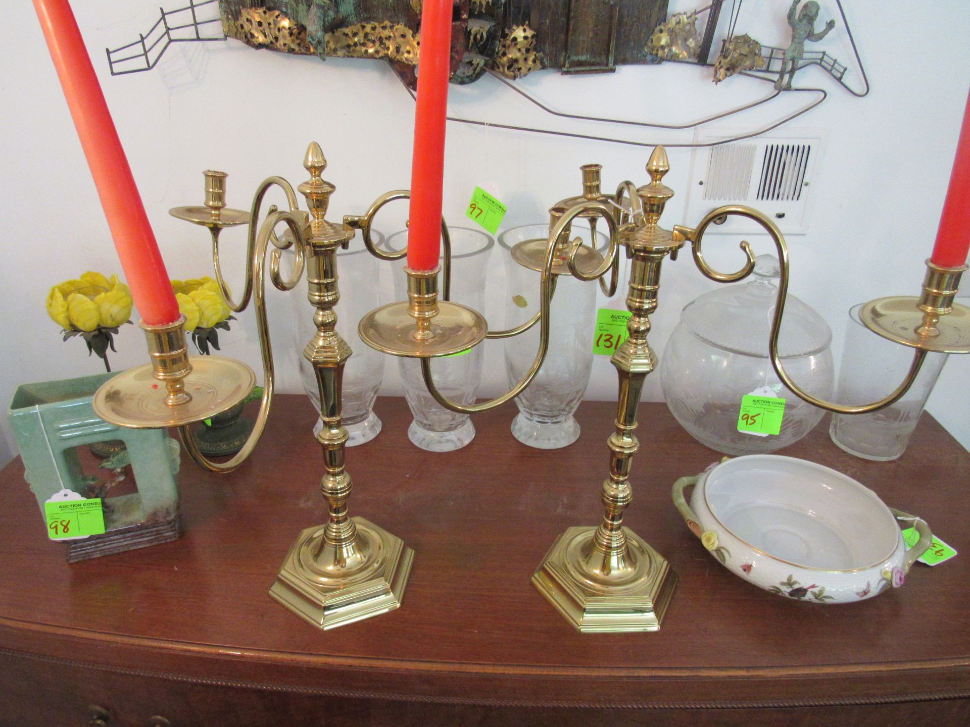 Pair of English style brass candelabras each fitted with three candle arms, height 19½”