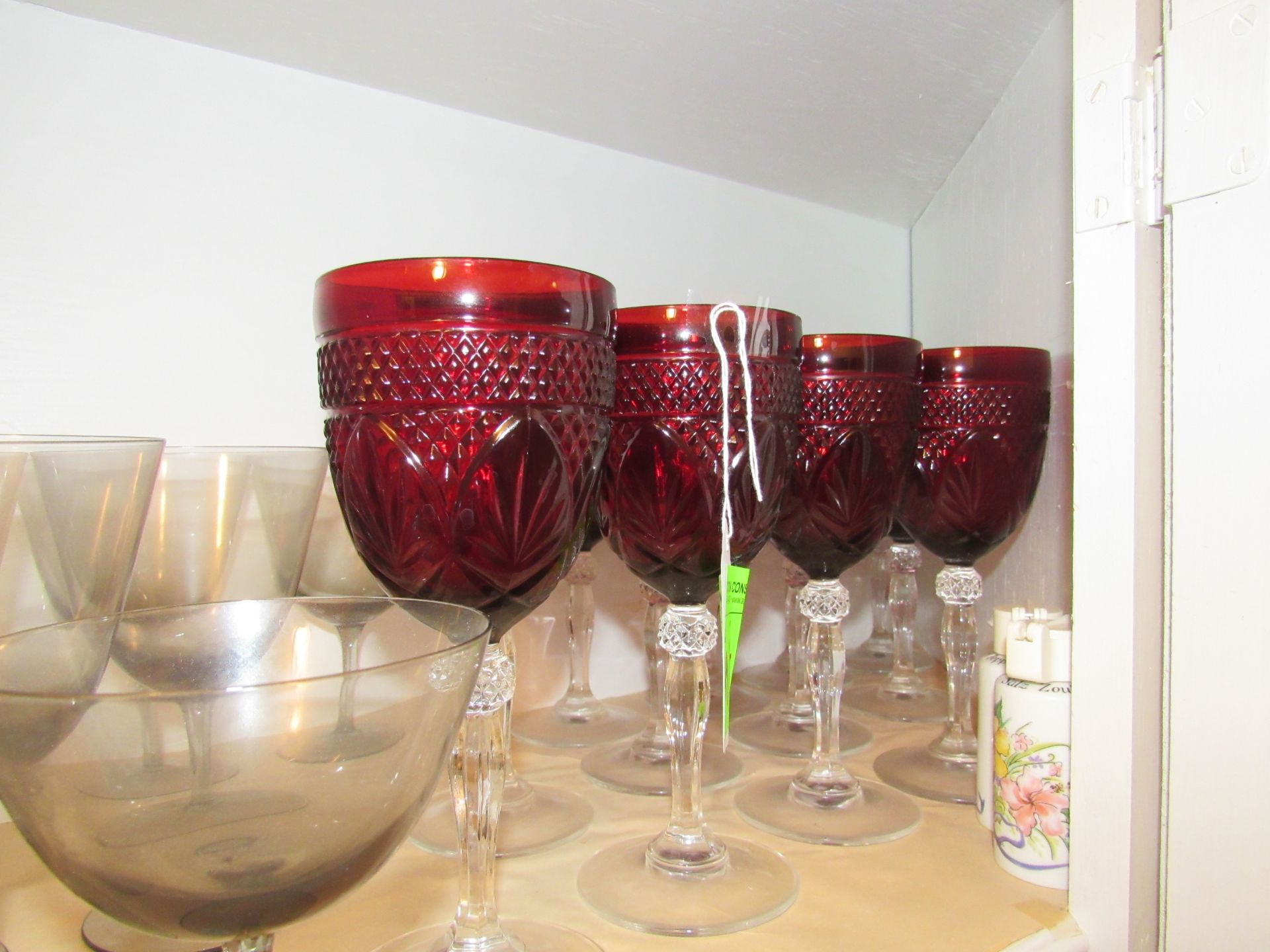 Twelve ruby wine glasses