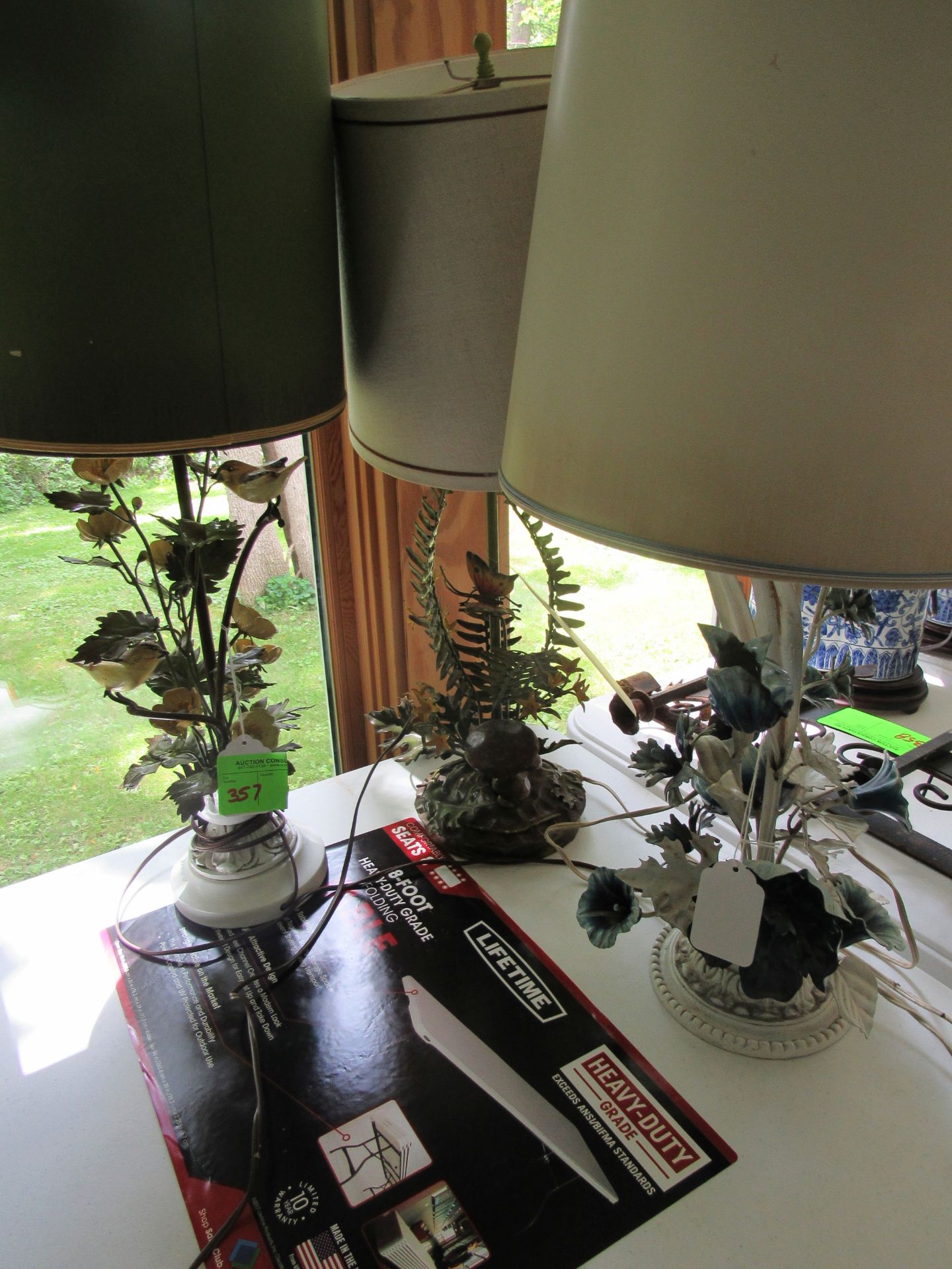 Three floral style table lamps