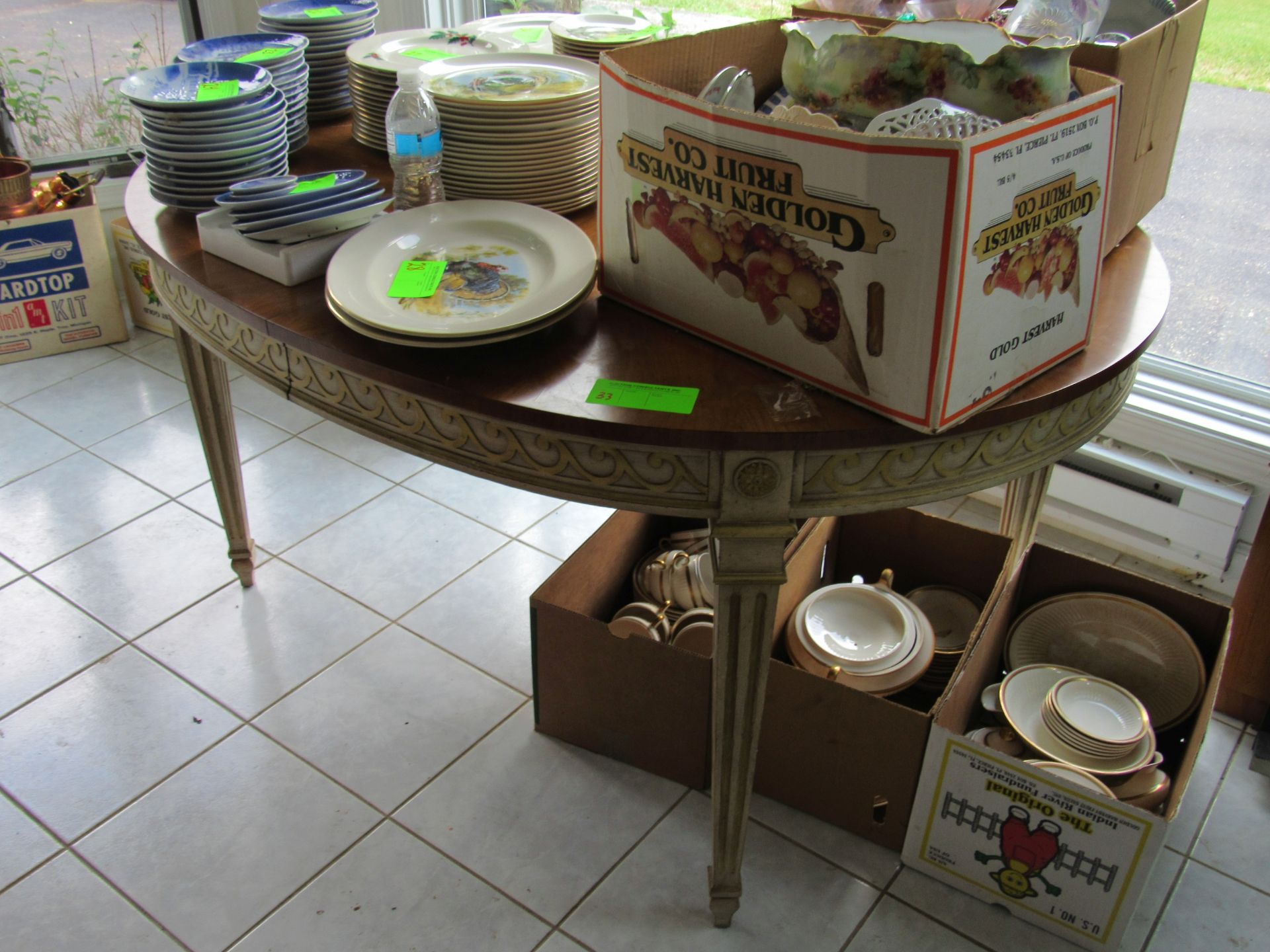 Oval dining table with two leaves