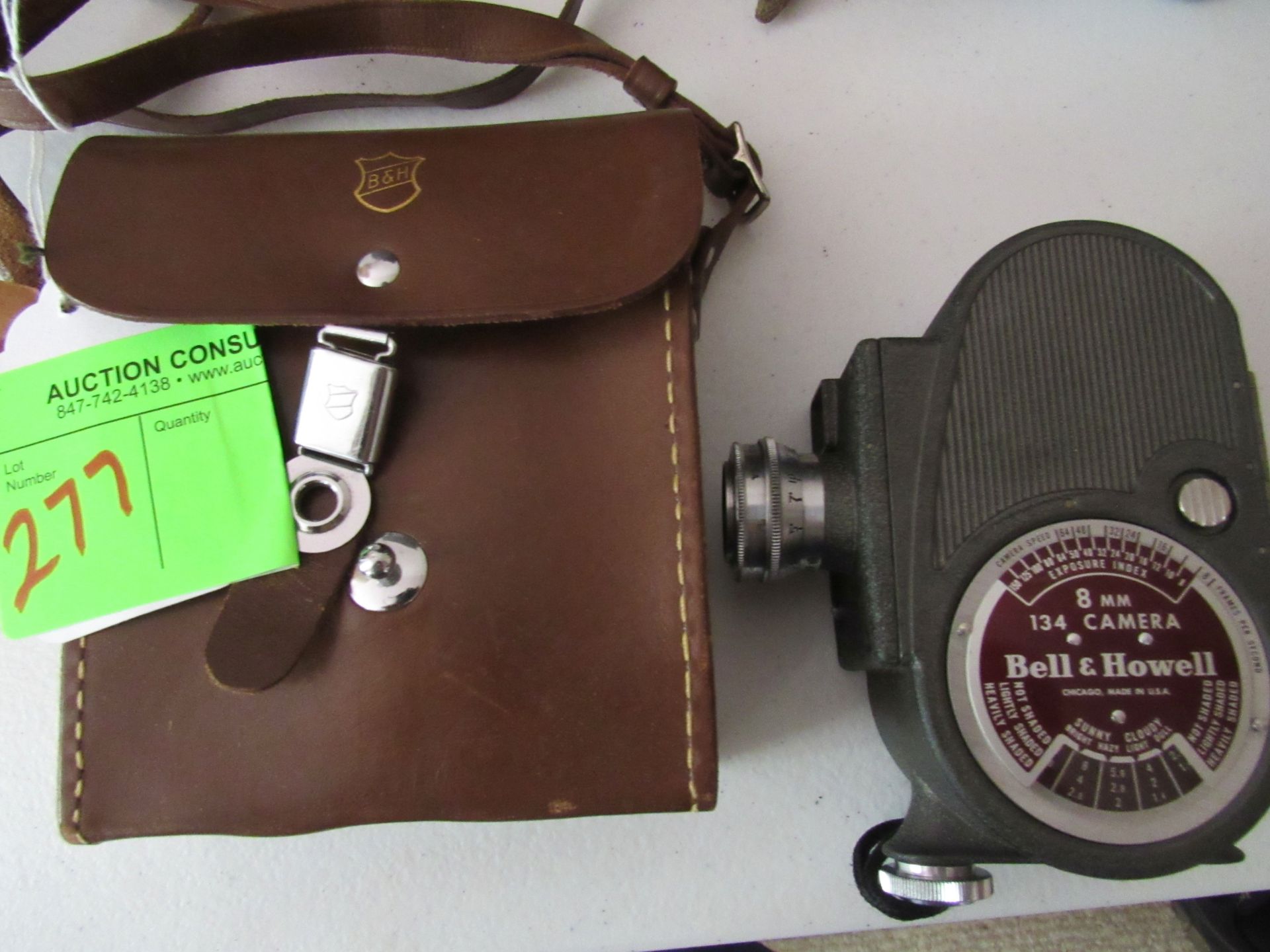 Bell & Howell 8mm 134 camera with leather case