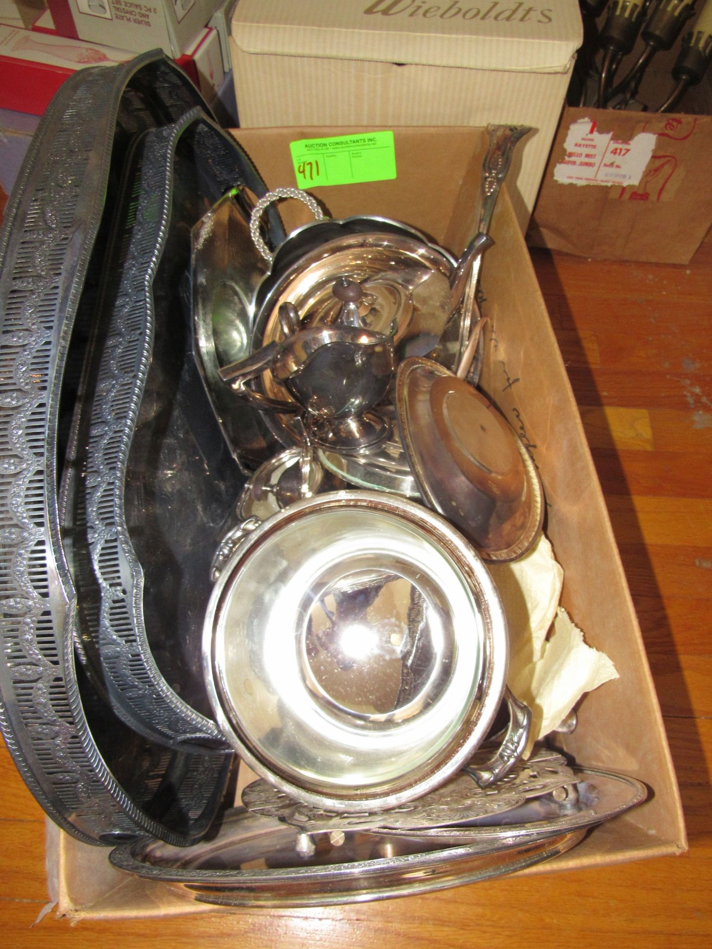 Box of silverplate serving utensils and trays