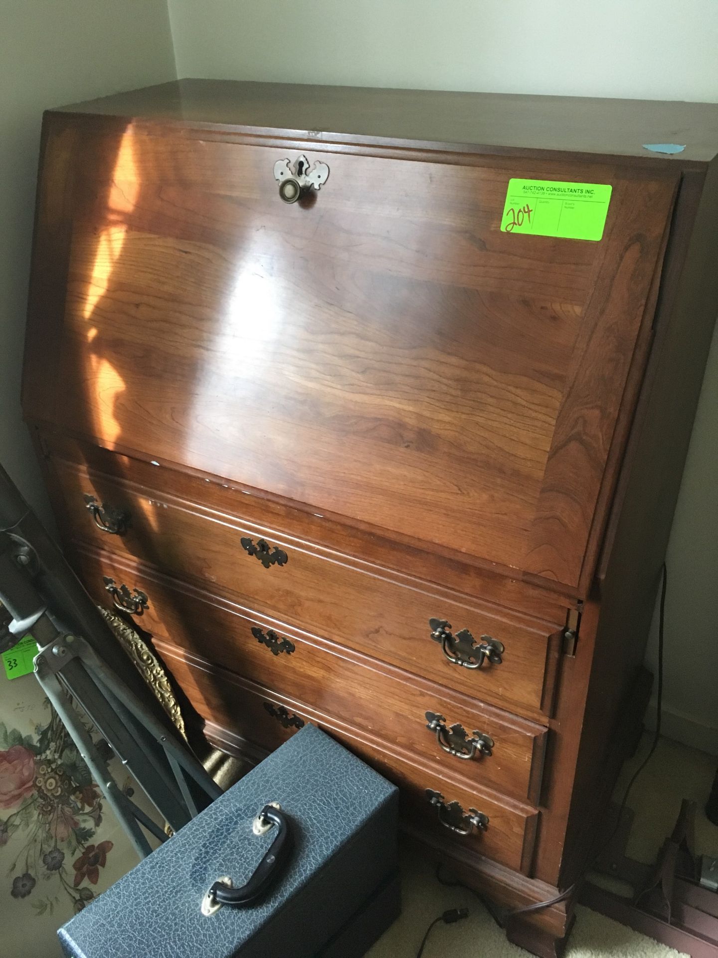 Three drawer cabinet with fold down desk