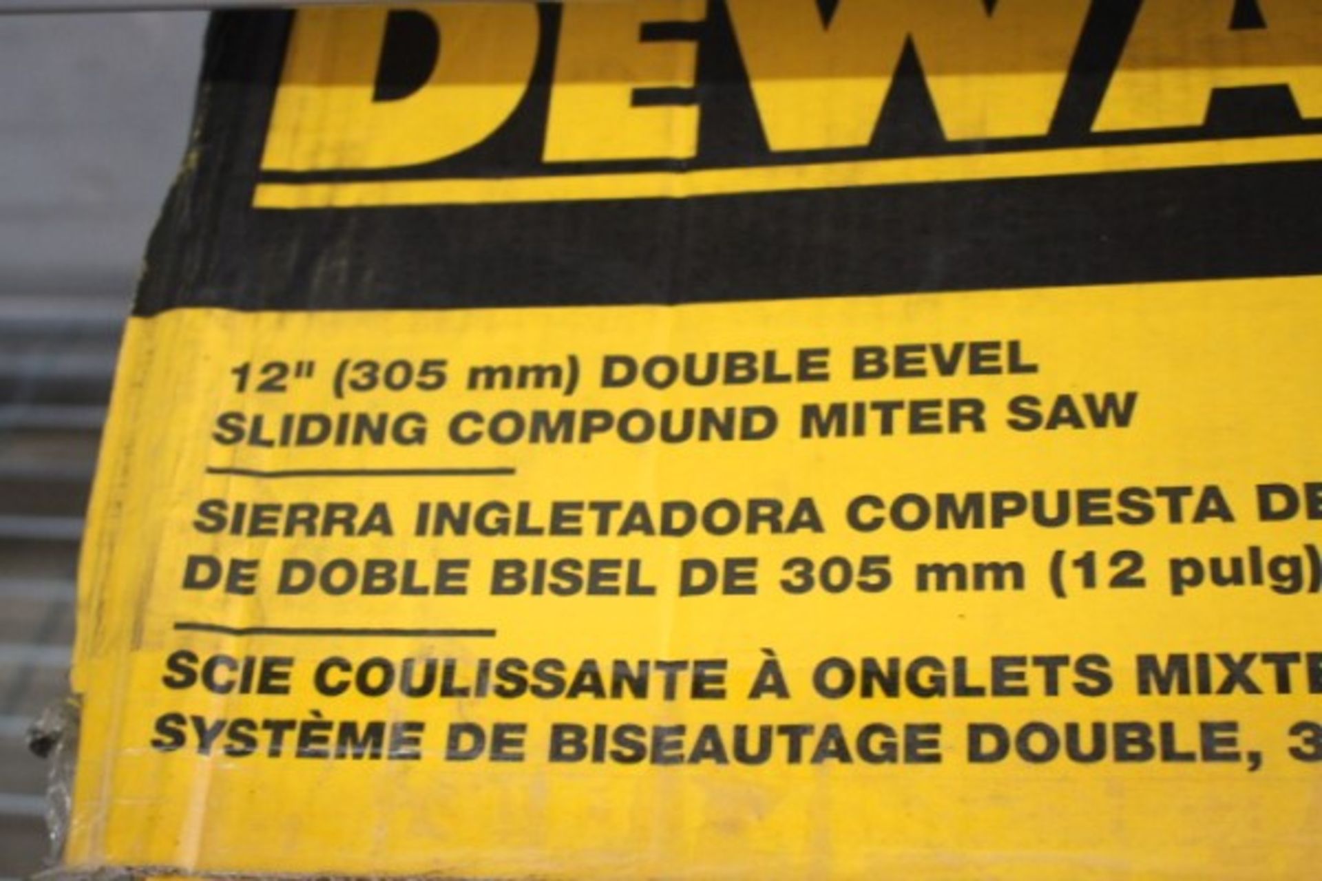 New Dewalt 12" Double Bevel Sliding Compound Miter Saw M#DWS780 - Image 2 of 2