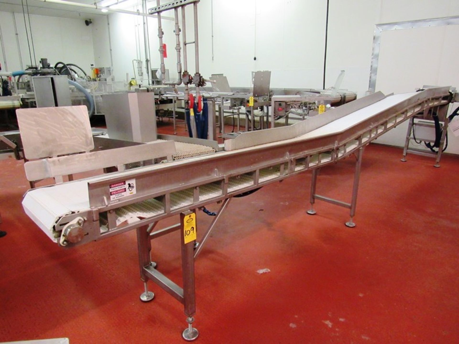 Conveyor, 16 1/2" W X 20' L plastic belt, slight incline, hydraulic operation ($75.00 Required