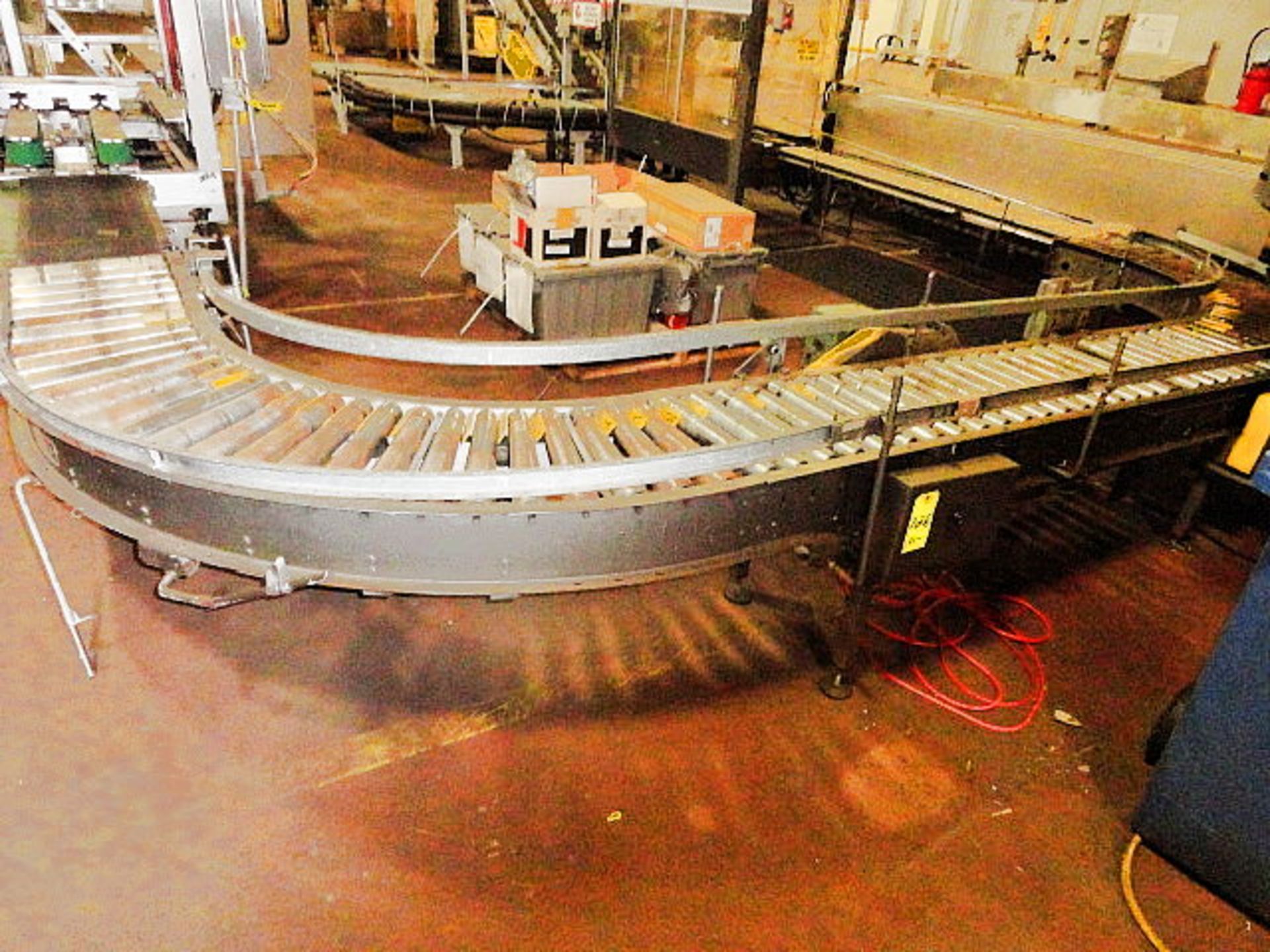 180º Powered Roller Bar Conveyor, 14' radius & (2) Hytrol belt conveyors, ($900.00 Required