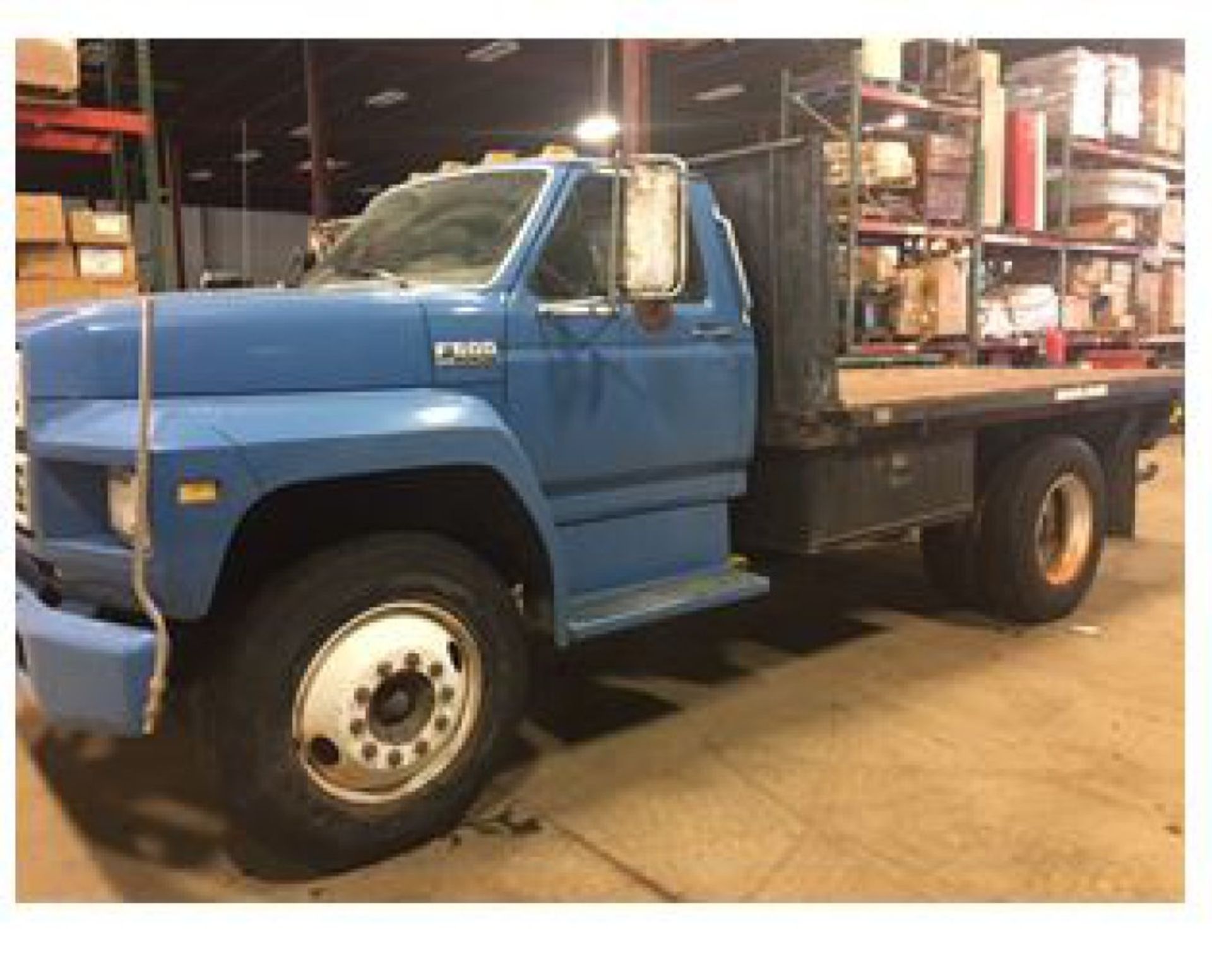 1993 Ford F-600 Diesel flat bed.