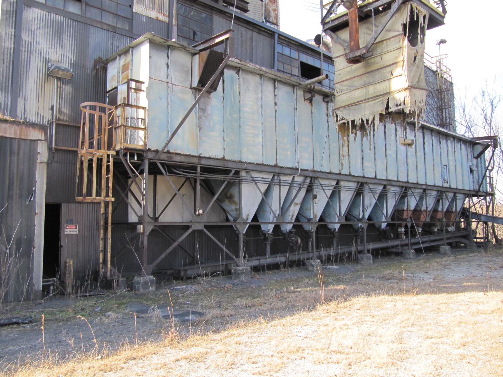 Lot including vibratory screen, assorted steel and stainless duct work, bucket elevator (not