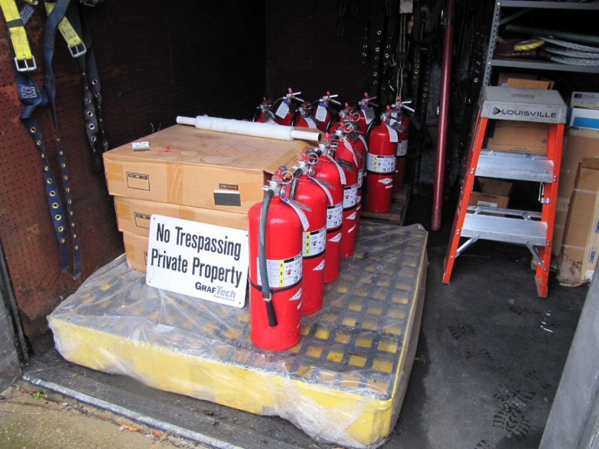 Lot including (28) assorted dry chemical fire extinguishers, 3' step ladder, (3) assorted spill