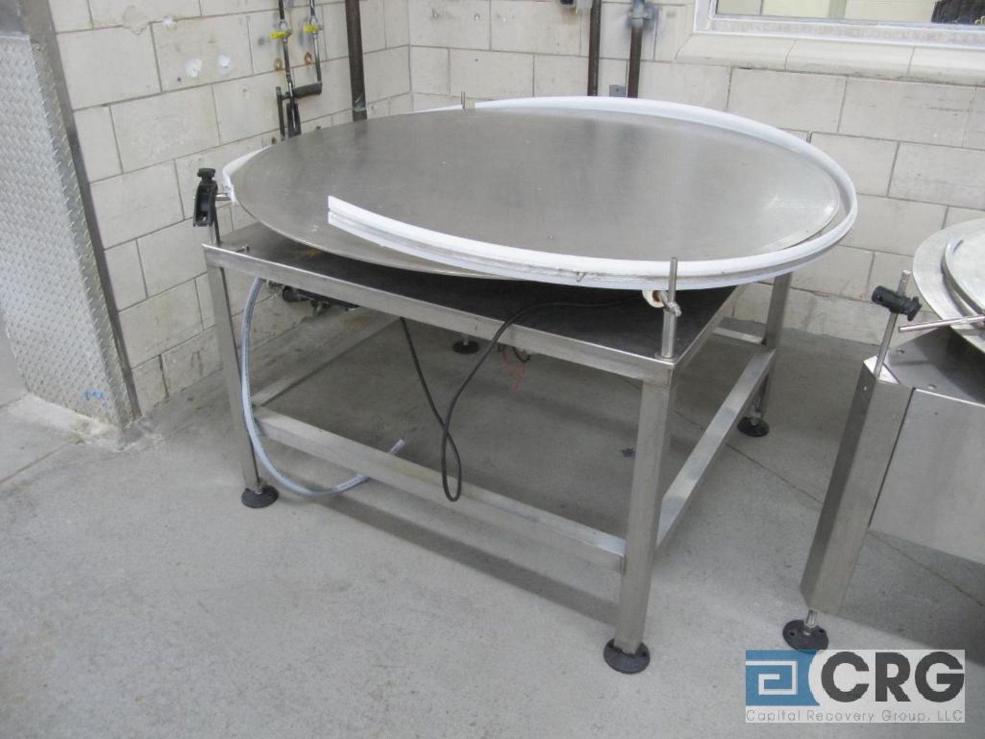 stainless accumulation table, 59" dia.