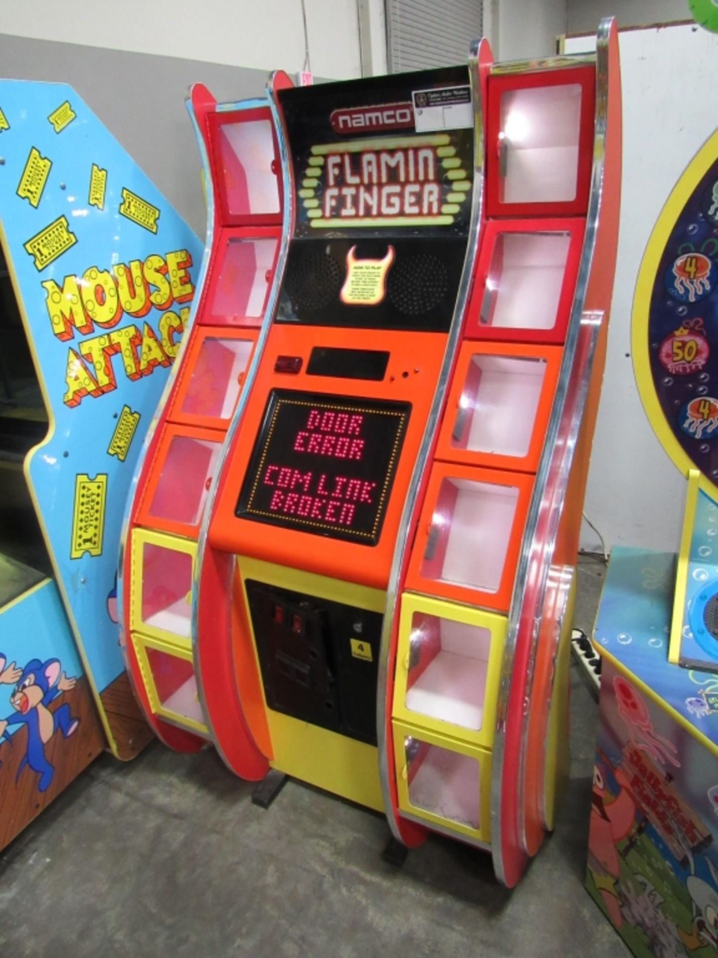 FLAMIN FINGER INSTANT PRIZE REDEMPTION GAME NAMCO Item is in used condition. Evidence of wear and - Image 2 of 2