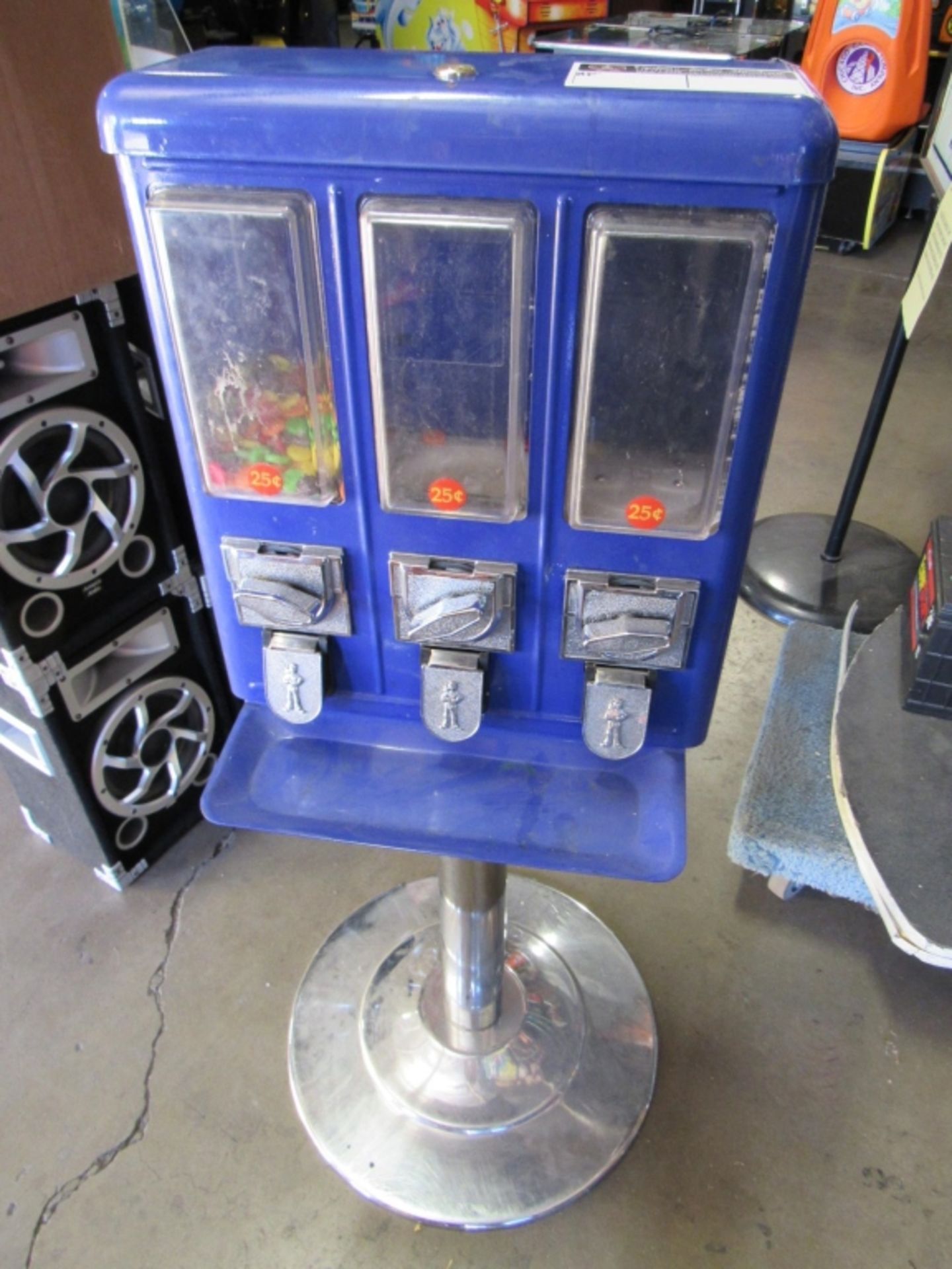 TRIPLE VEND CANDY BULK VENDING STAND Item is in used condition. Evidence of wear and commercial