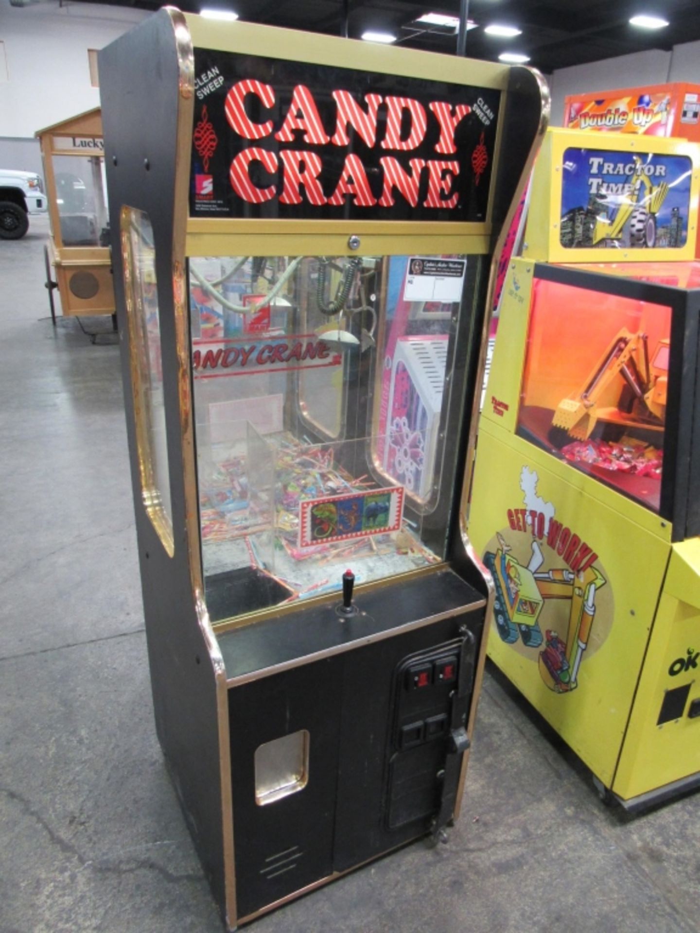 24" SMART CLEAN SWEEP CANDY CRANE MACHINE BLK Item is in used condition. Evidence of wear and