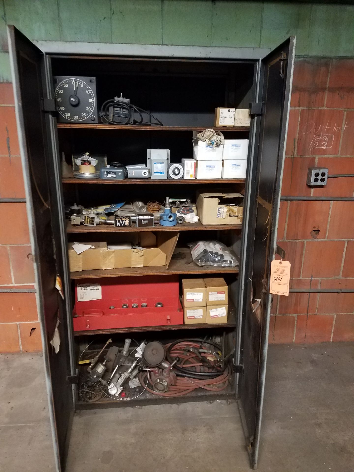 2-DOOR CABINET & CONTENTS(LOCATED AT 2000 TAYLOR STREET, FORT WAYNE IN 46802)