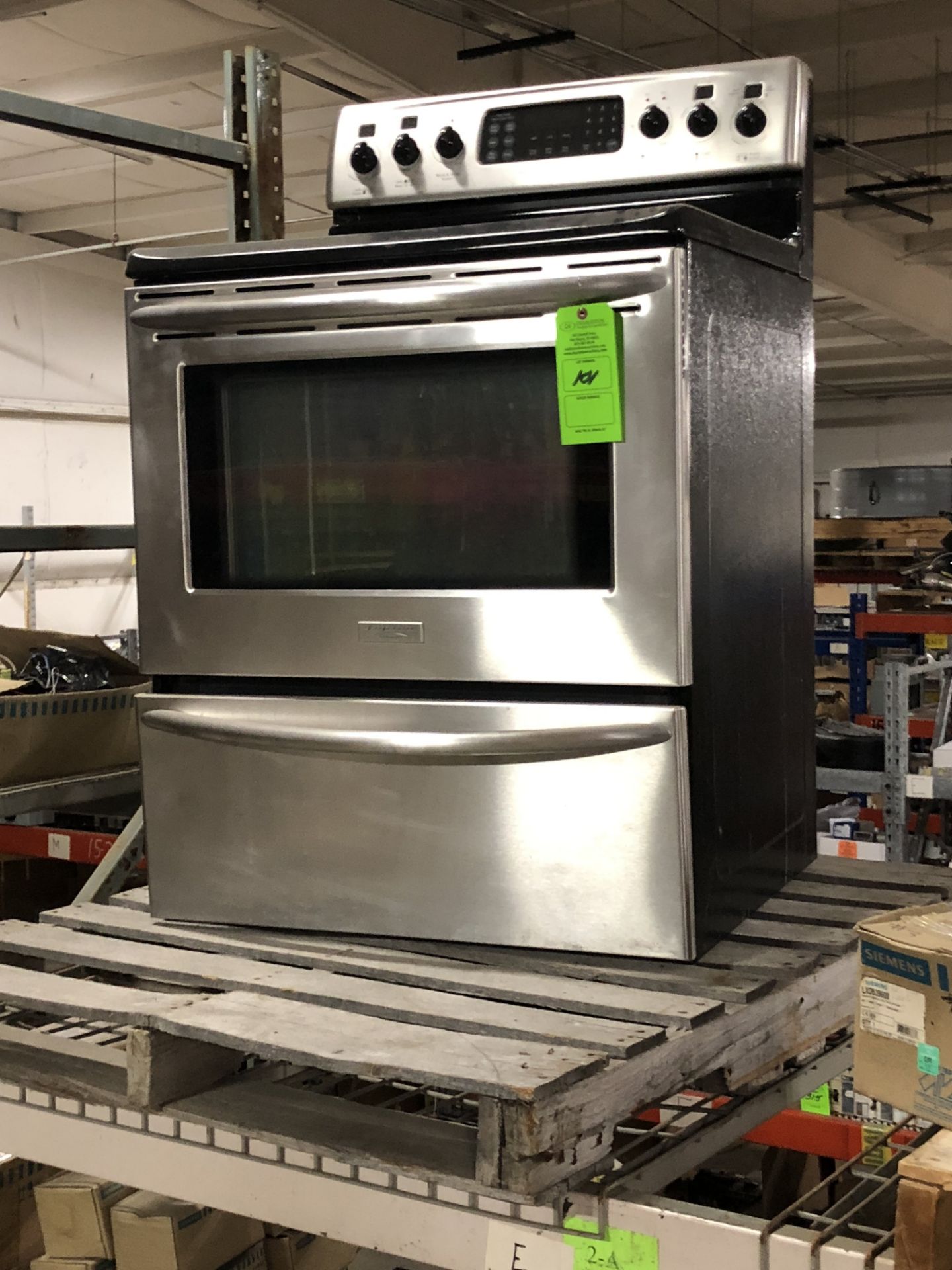 FRIGIDAIRE ELECTRIC GLASS TOP CONVECTING STAINLESS STEEL STOVE (ONLY TWO YEARS OLD)