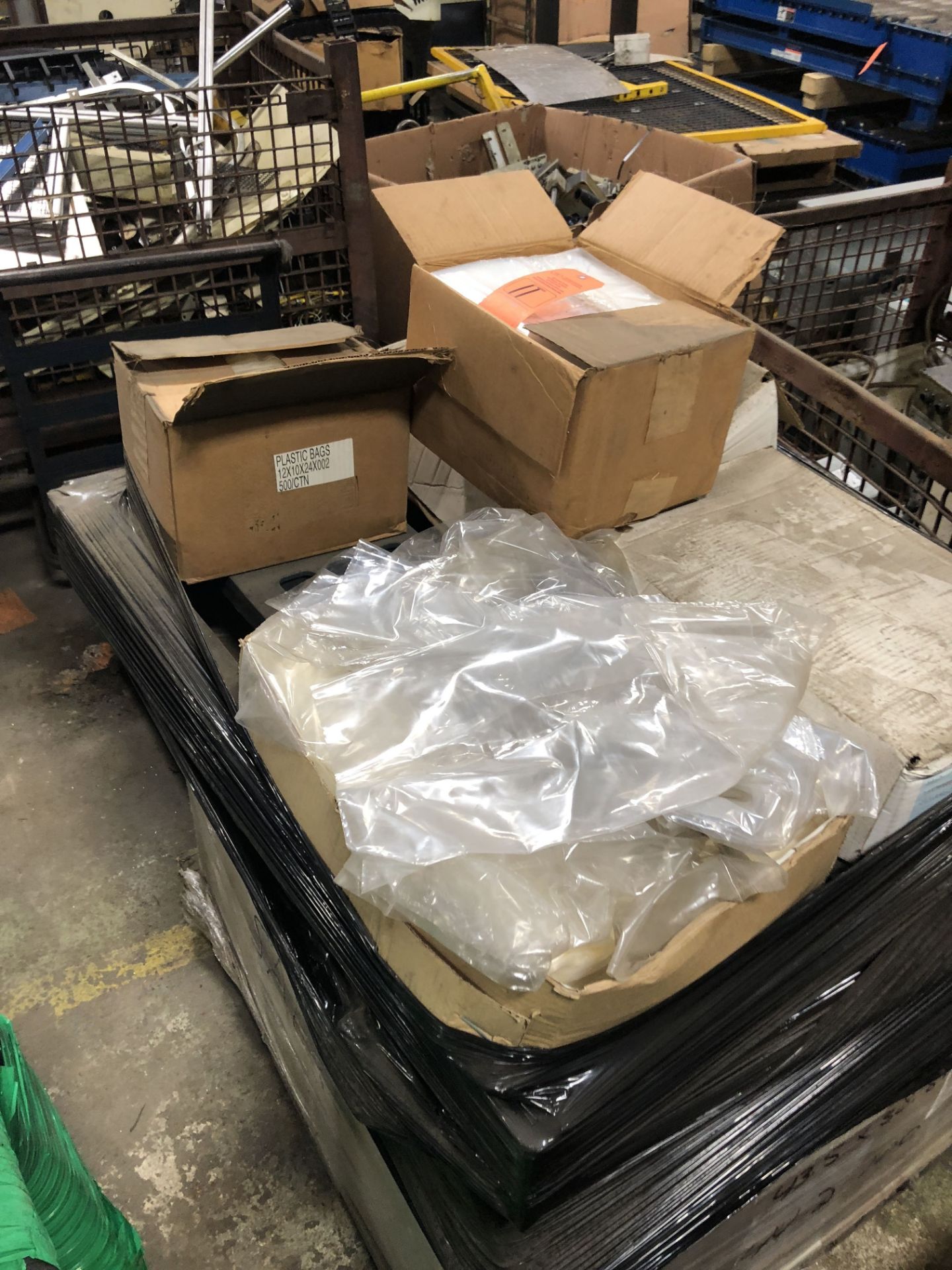 PALLET O F PLASTIC BAGS & BLUE VCI SHEETS