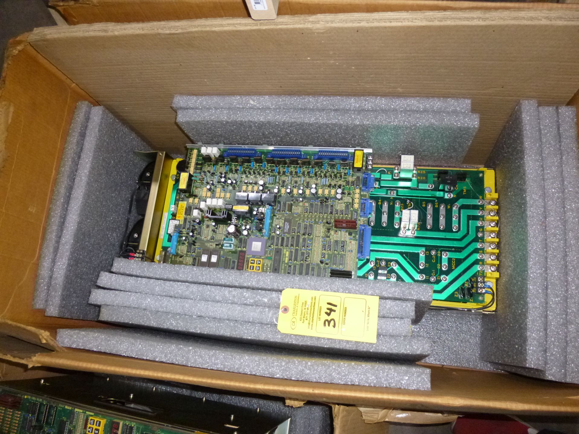Fanuc AC spindle servo unit model A06B-6059-H218, appears new/unused in box, box shows wear, as
