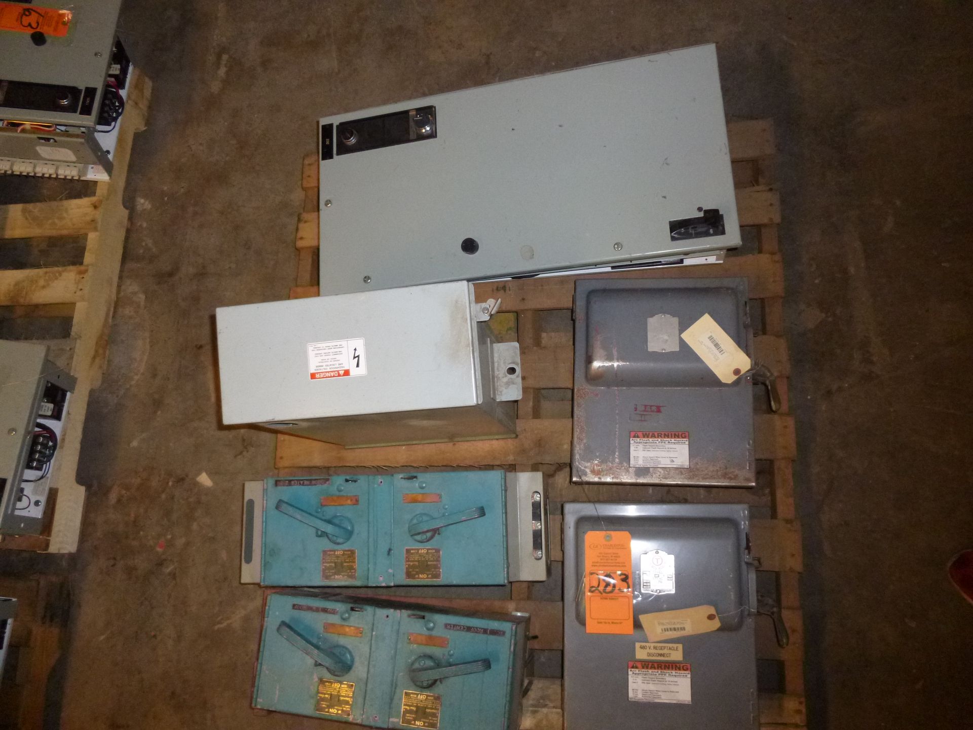 Pallet of assorted disconnects and buckets, buss plugs, etc