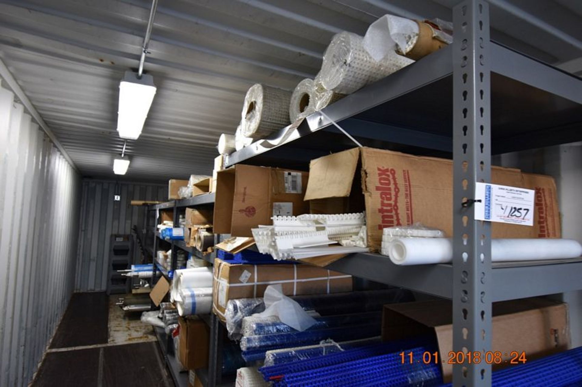 | One Lot on Shelving of conveyor belts and rollers. Includes shelving | MODEL# | SERIAL# | * - Image 8 of 9