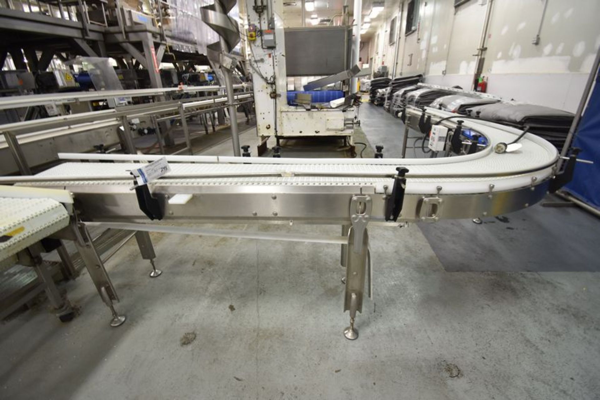 Flexlink Conveyor | Stainless transfer conveyor, 90 degree turn. Plastic  belt. 12" wide, 18' tota
