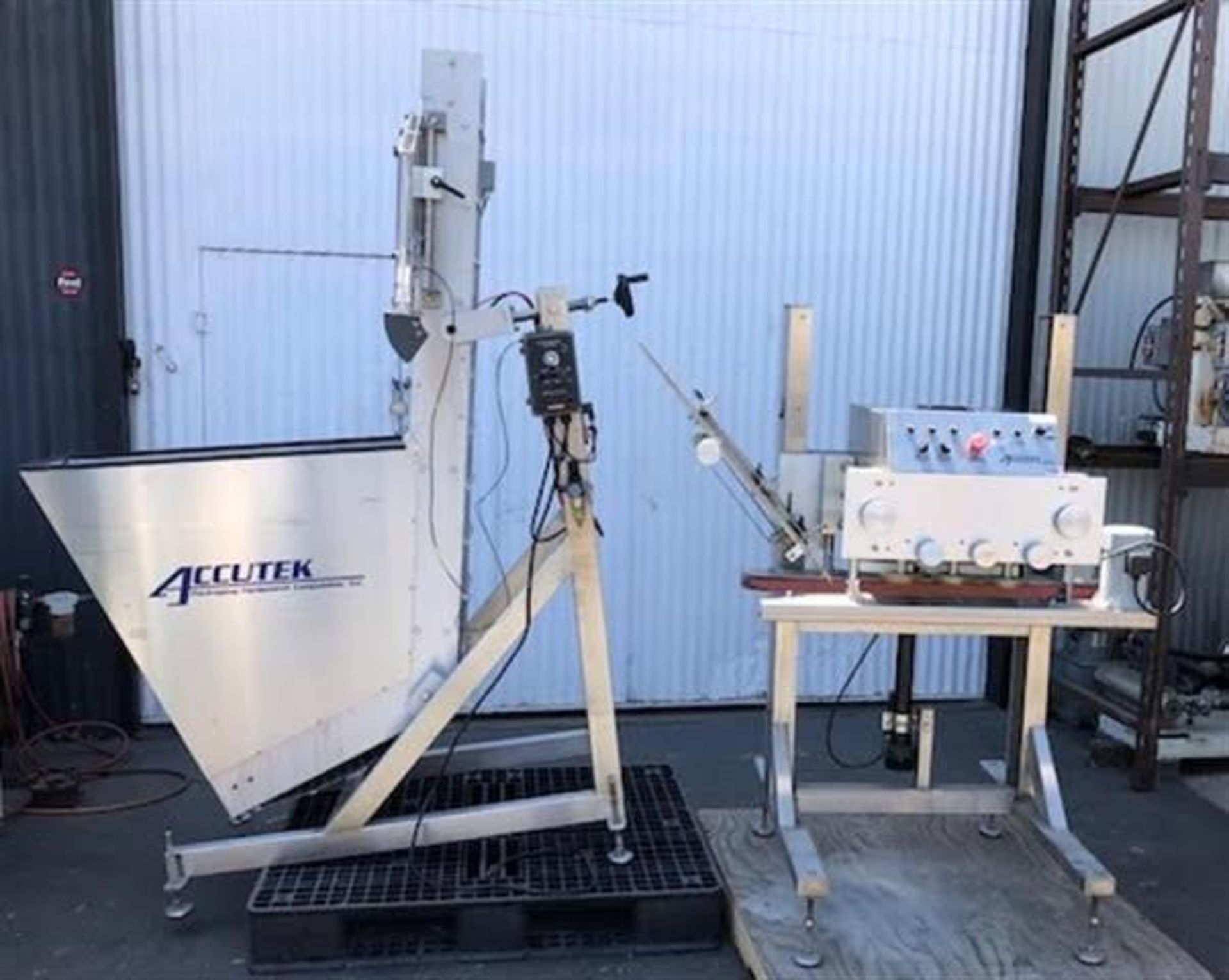 Accutek 6 Spindle Capper and Elevator