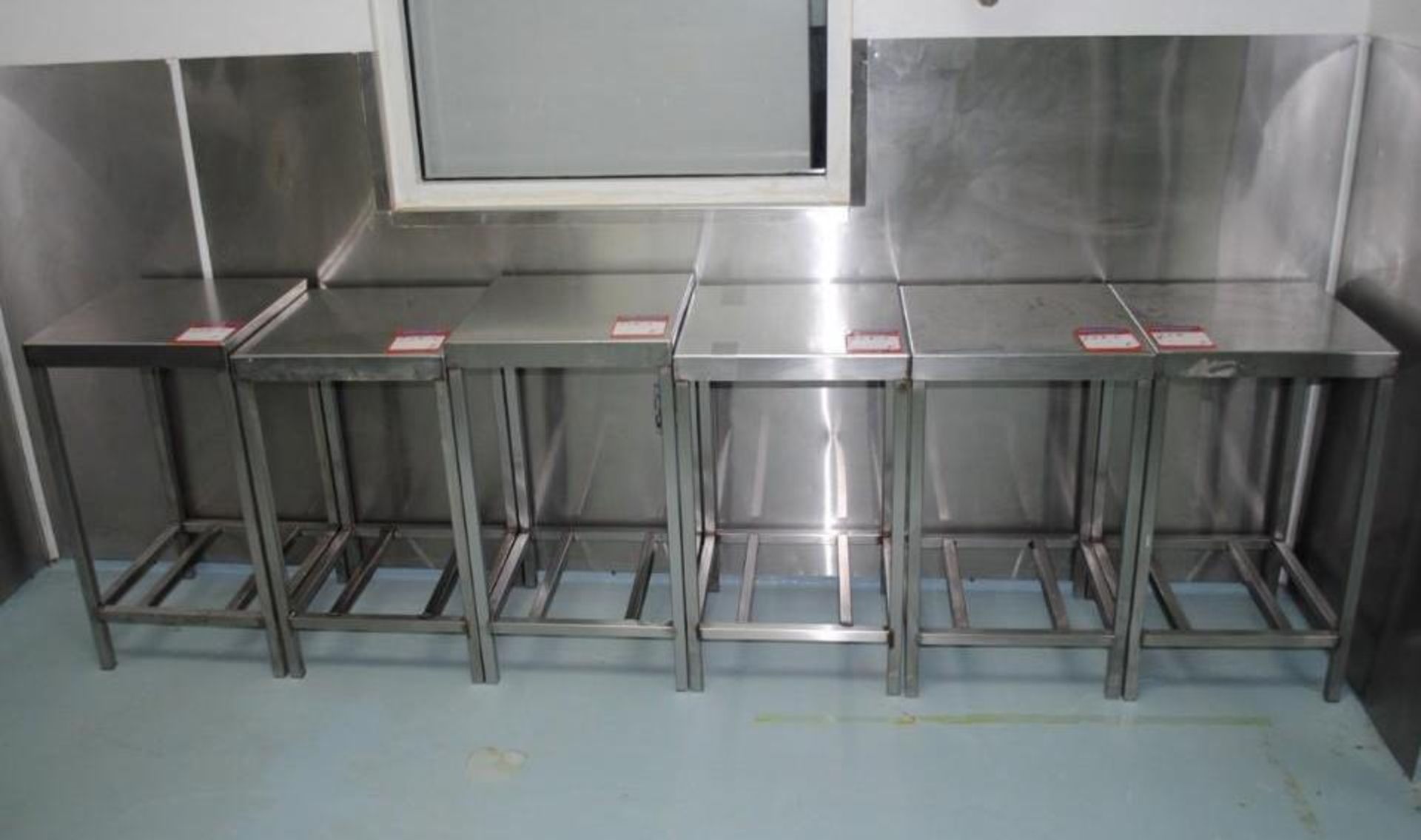 Six Stainless Steel Tables