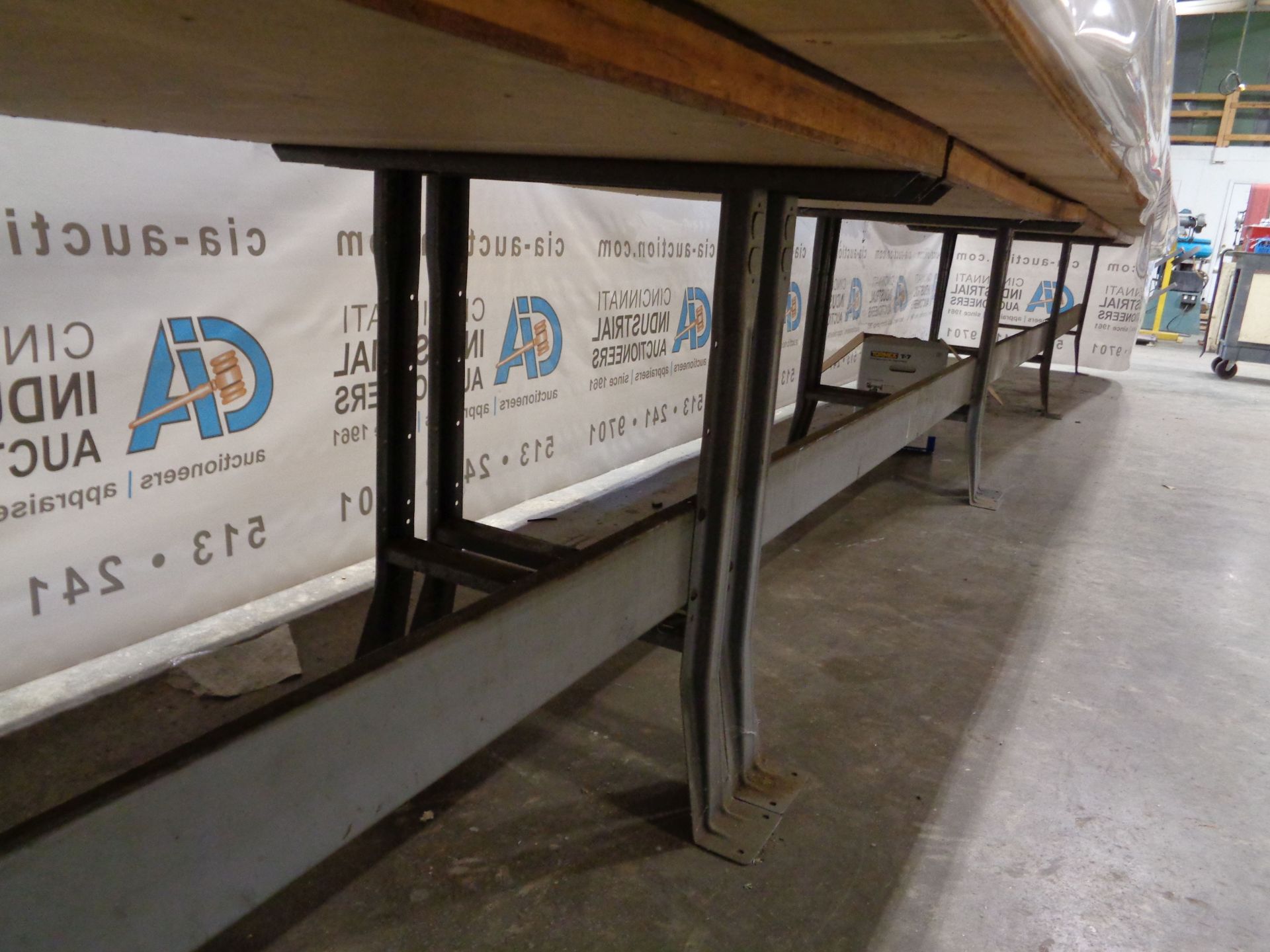 36" X 72" X 33" HIGH APPROX. STEEL FRAME WOOD TOP BENCHES W/ (4) SHEETS PLYWOOD **DELAYED REMOVAL