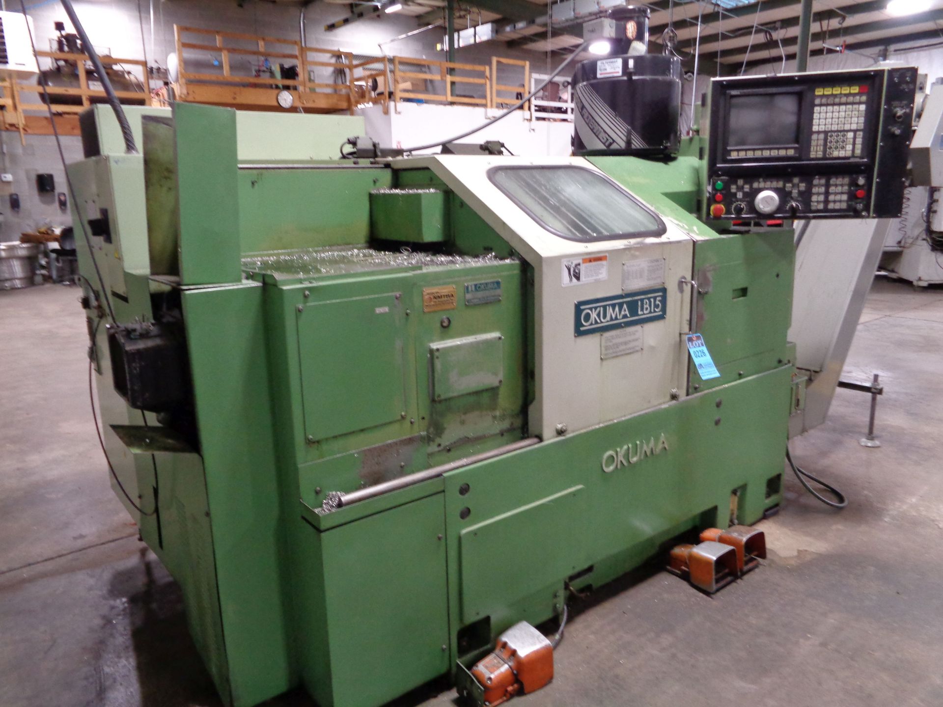 1990 OKUMA MODEL LB-15BB CNC TURNING CENTER; S/N 9983