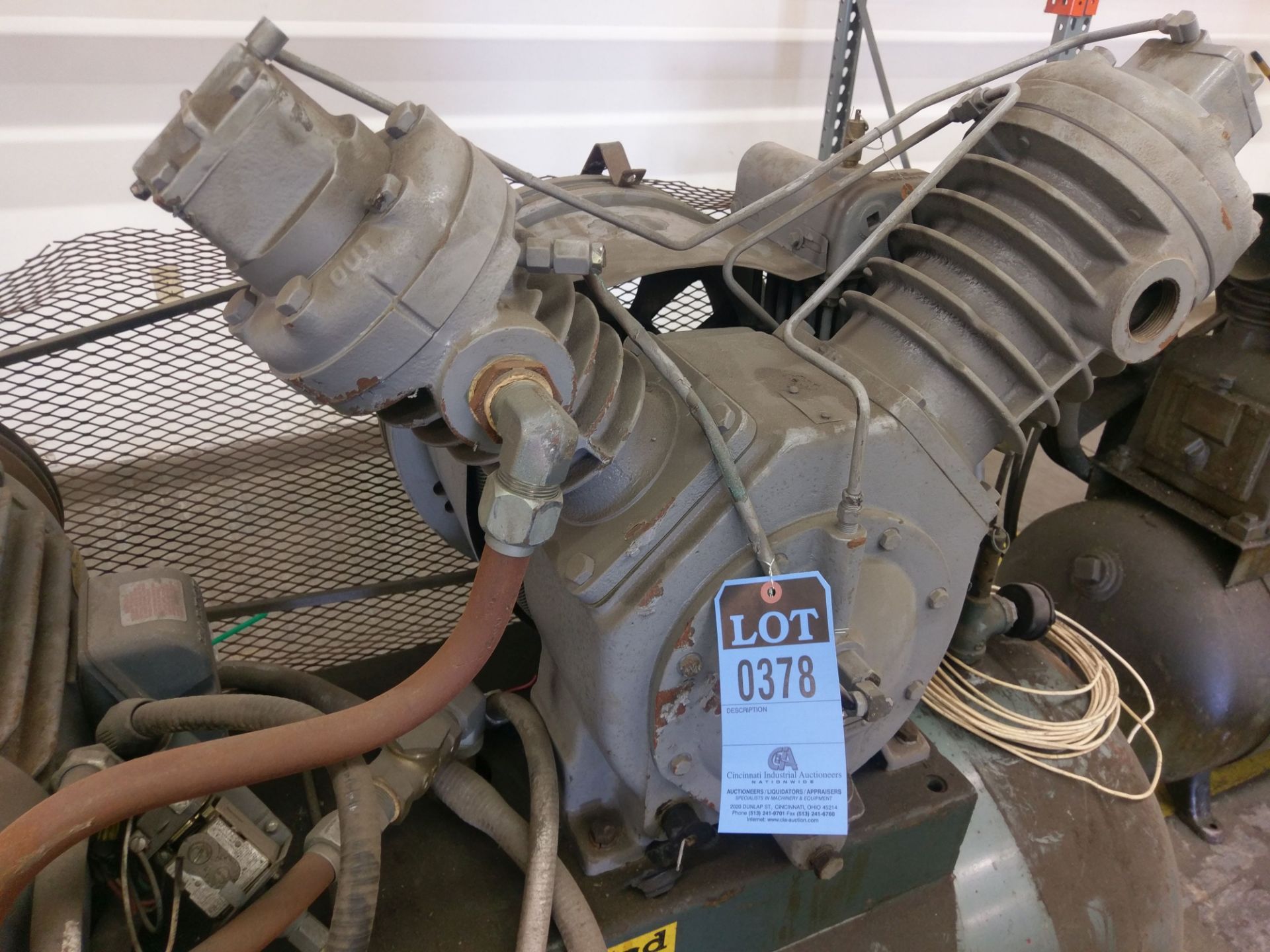 10 HP INGERSOLL RAND MODEL 71TZ HORIZONTAL AIR COMPRESSOR; S/N 30T900056 **LOCATED 3201 ALBERTA ST.,