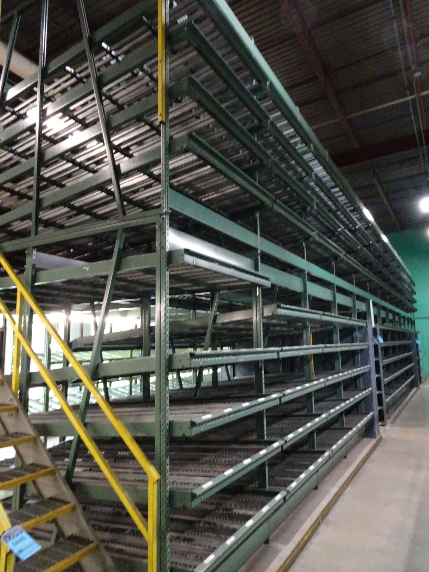 25' WIDE X 235' LONG TWO-STORY SPACE LOFT MEZZANINE WITH (24) SECTIONS 60" WIDE X 128" DEEP X 19'