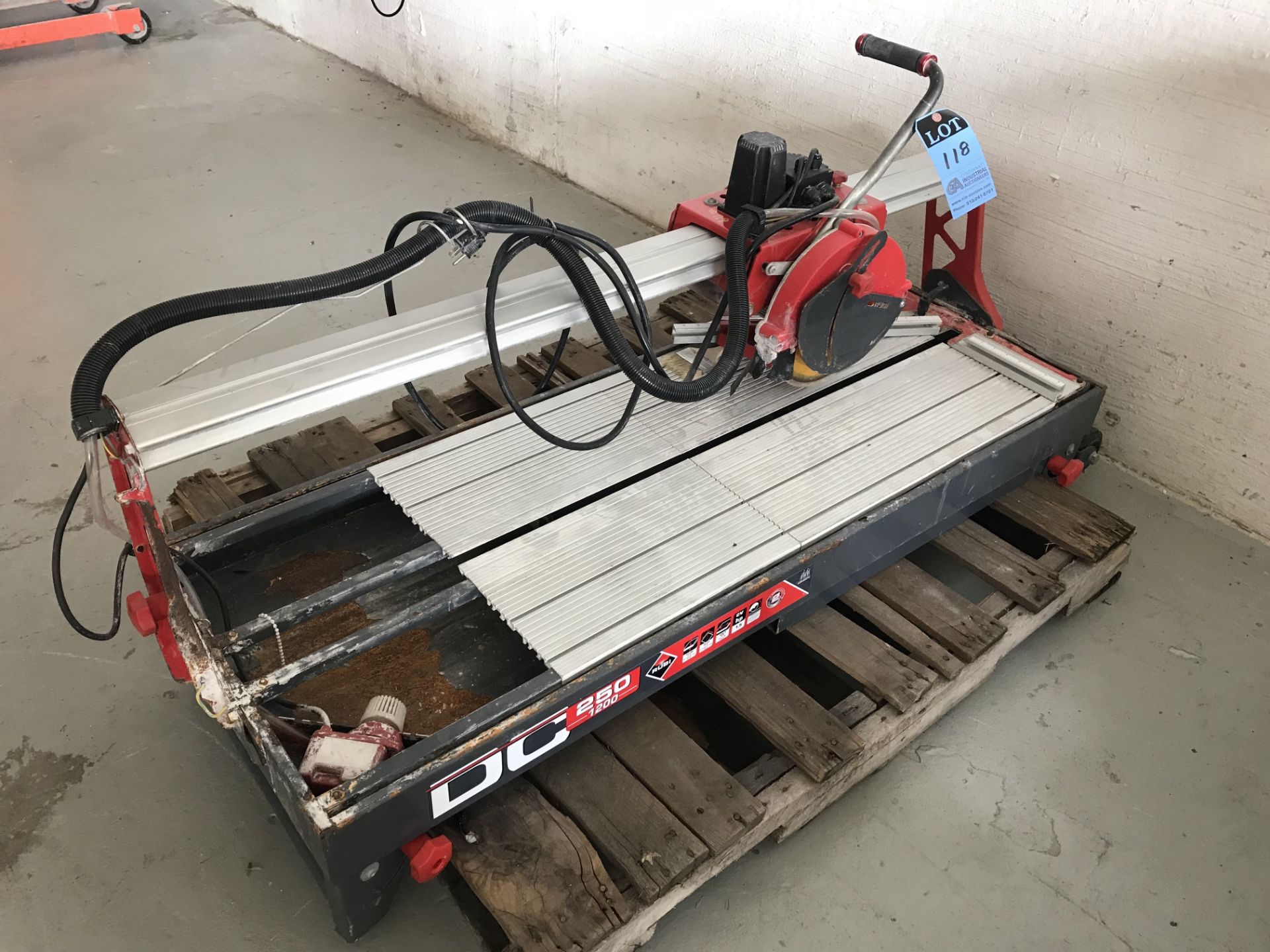 RUBI MODEL 250/1200 WET SAW, 36" TRAVEL, 19" X 36" TABLE SIZE **LOCATED AT 100 SEA RAY DR.,