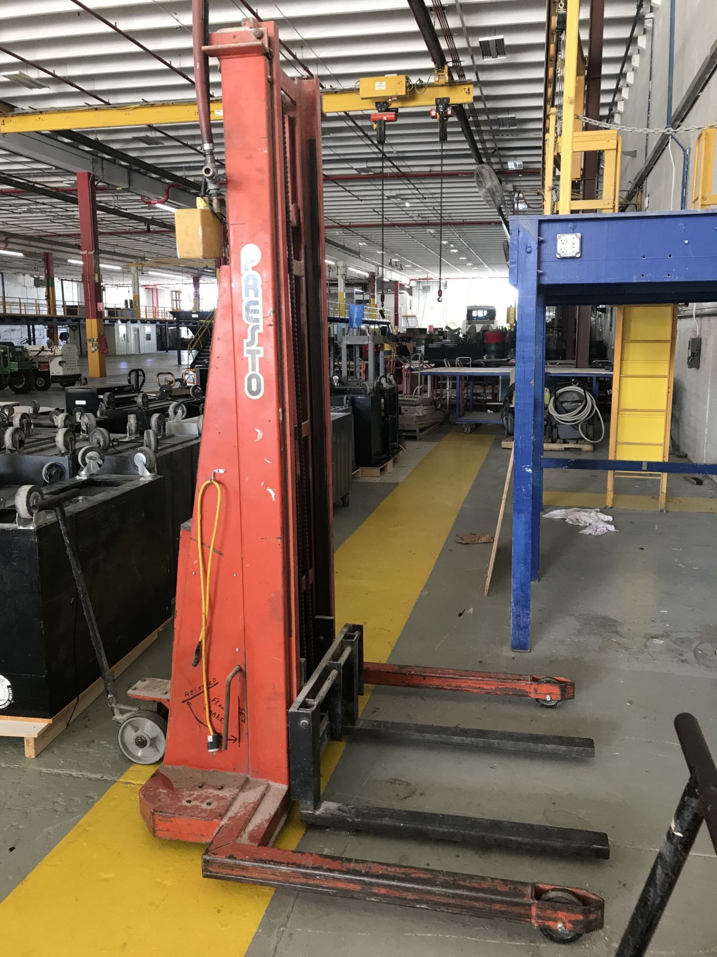1,500 LB. PRESTO MODEL PST144-50 ELECTRIC WALK BEHIND STACKER **LOCATED AT 100 SEA RAY DR.,